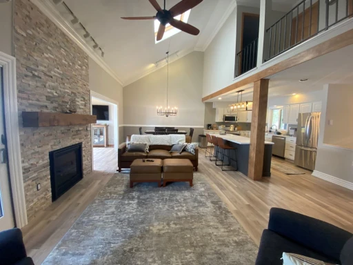 lake-wallenpaupack-home-interior Open-concept living room and kitchen in a beautifully updated Lake Wallenpaupack home.